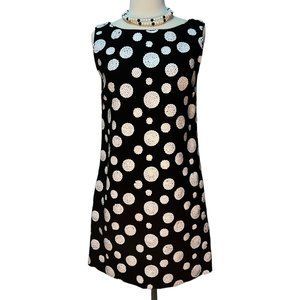 Adorable short black dress with white sequin circles
